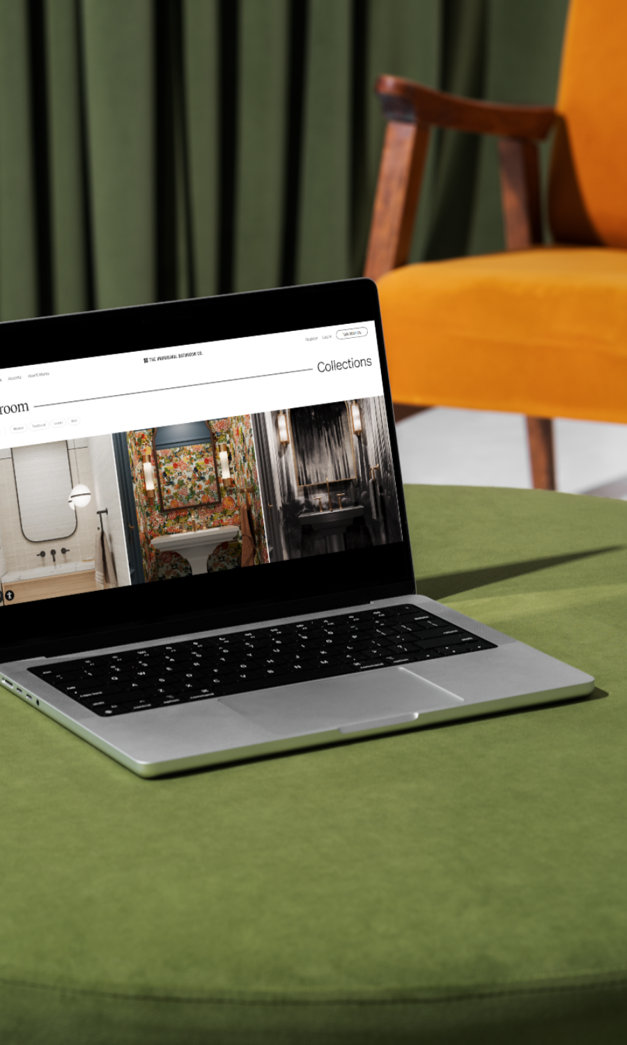 A website on a laptop on a green ottoman with orange chain in background.