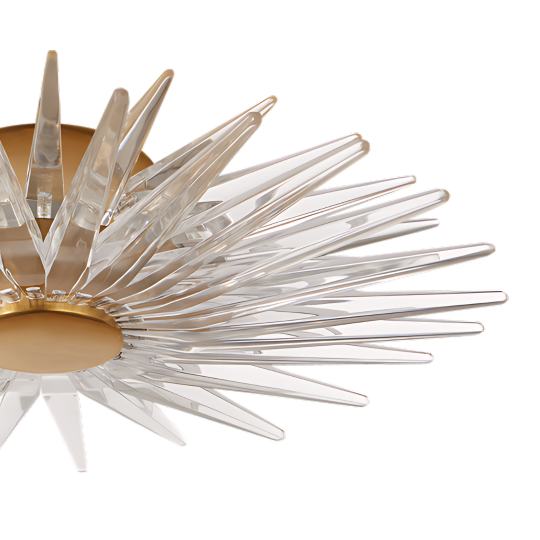Brass and glass starburst ceiling light on white background