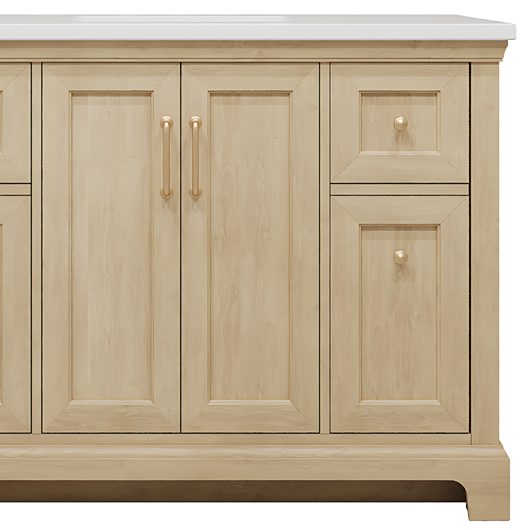 A wooden vanity with gold handles.