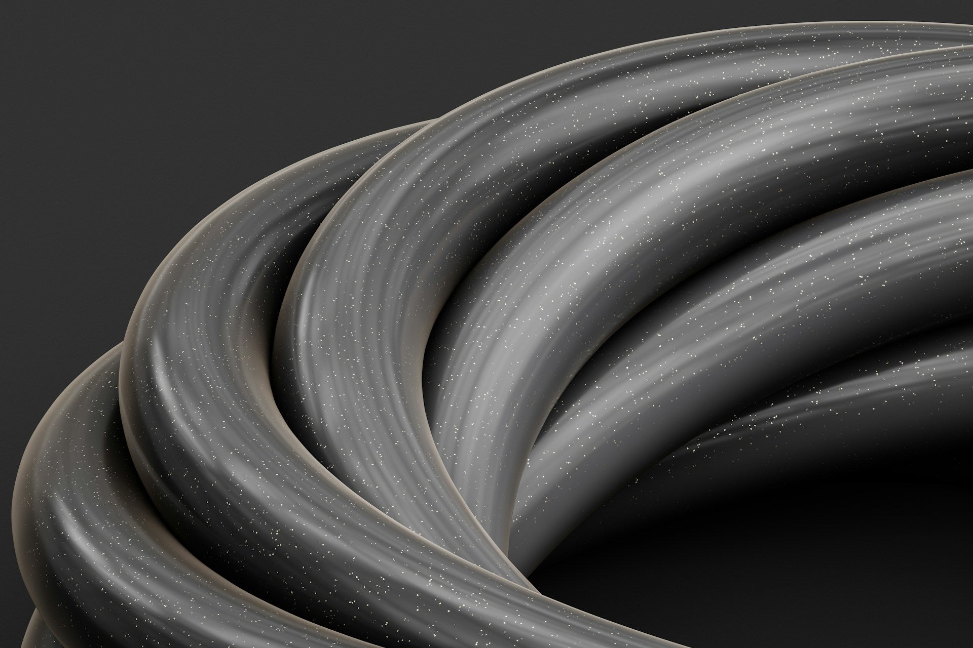 A close up of a bunch of black rubber tubing.