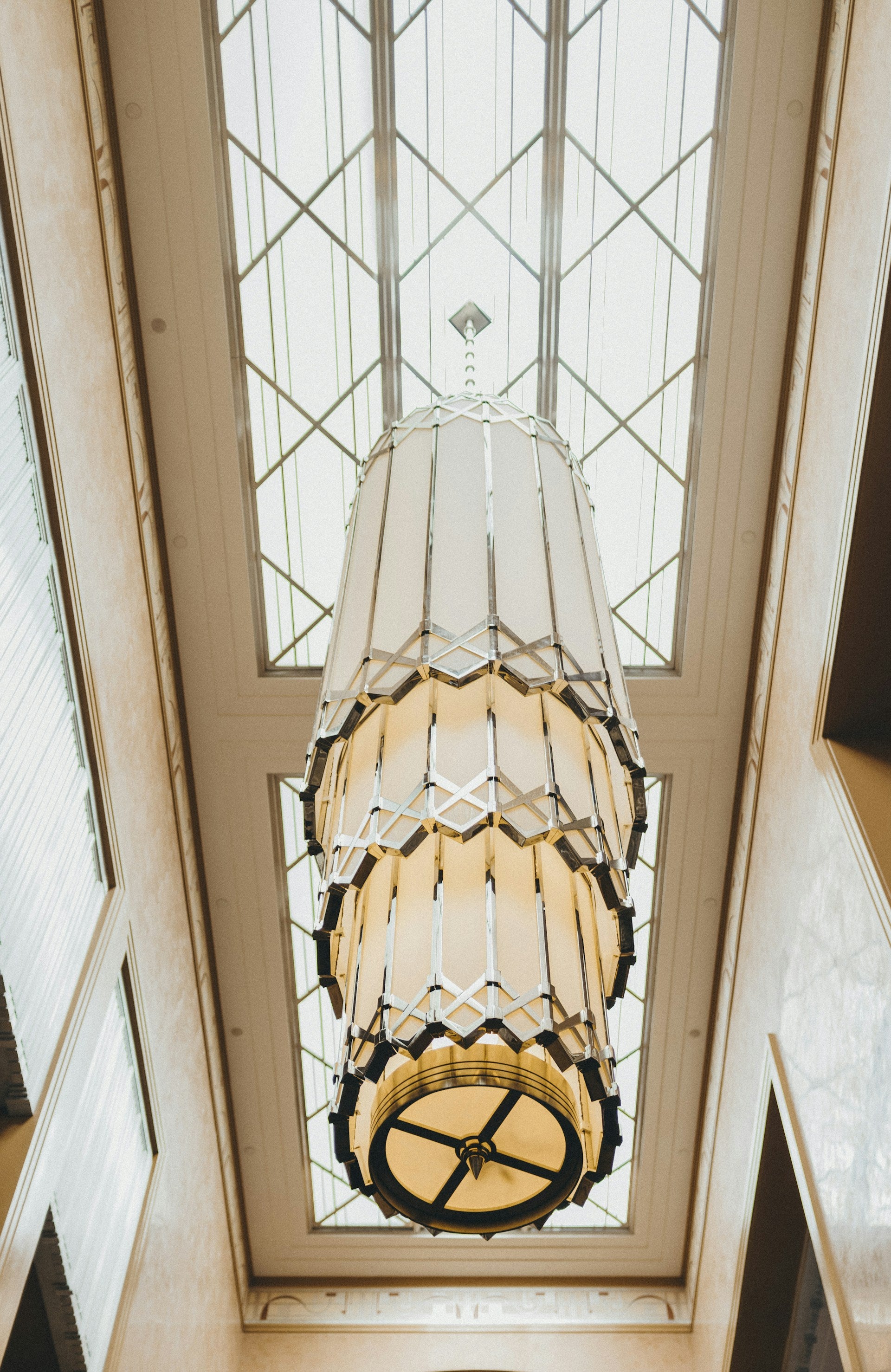 A chandelier hanging from the ceiling in a building.